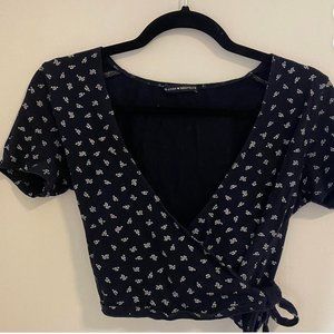 Brandy Melville navy blue and white floral wrap short sleeve top